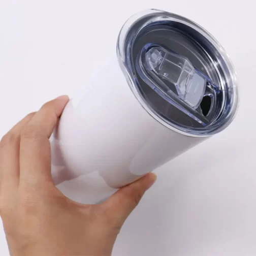 best position to hold a white cocktail tumbler with your hand